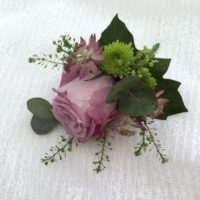 Lilac rose boutonniere