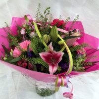 Pink tied wrapped bouquet